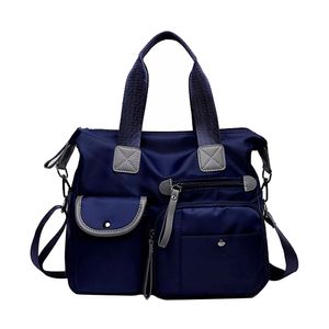 Bolso Bandolera Impermeable Azul South Port Con Bolsillos y Cierres
