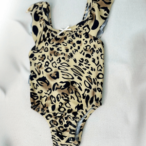 Malla enteriza animal print para bebes. Talles 6 a 24 meses